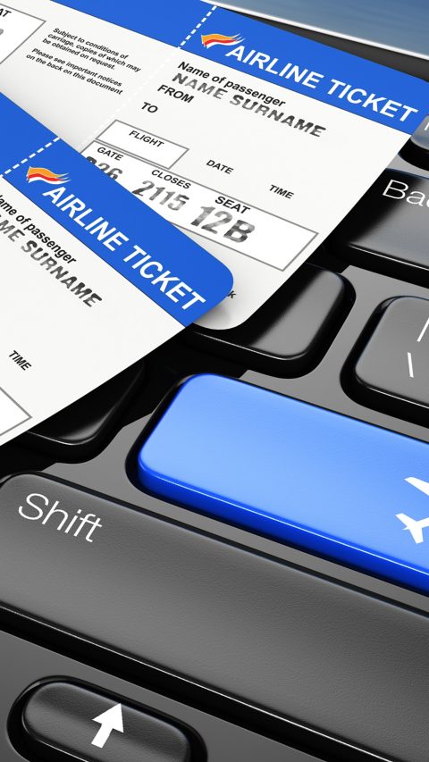 Online booking airplane tickets. Laptop keyboard.  3d