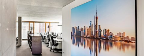 DIU Muenster office with photo of Shanghai 