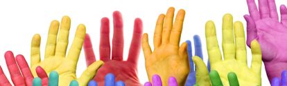 Many colorful hands waving and symbolizing diversity.